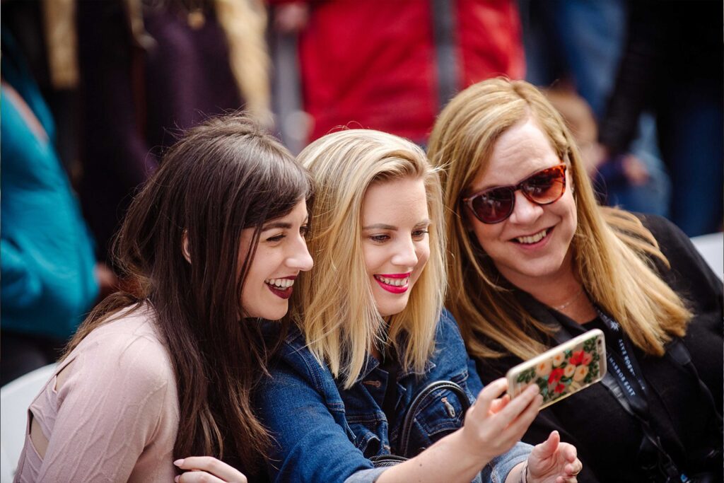 three women taking a selfie